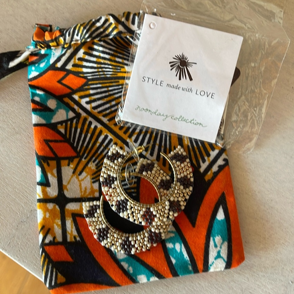 NWT and packaging Noonday hand beaded half hoop earrings.